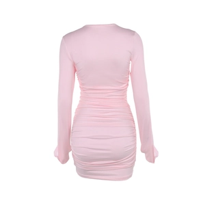 Back view of pink bodycon dress with elegant ruched design and long sleeves in detail