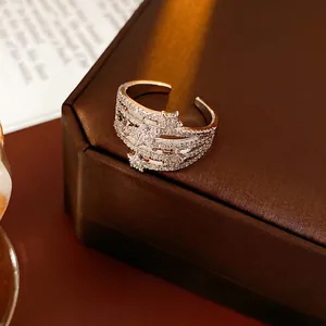 Luxurious layered zircon star open ring in silver finish with sparkling pave stones