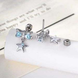 Silver starfish bow earrings set with blue heart crystals and screw-back closures