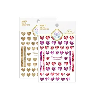 Metallic heart nail stickers in gold and magenta gem designs, EM-012 adhesive decals