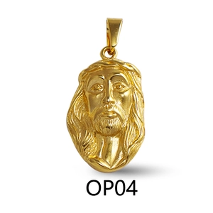 Macro detail of a gold-plated Hip Hop Jesus head pendant with clear textured engraving