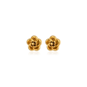 Macro detail of elegant golden rose stud earrings with a polished metallic finish