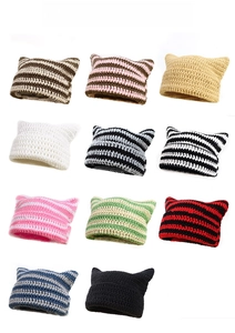 Detailed grid showing eleven color variants of handmade knitted cat ear beanies