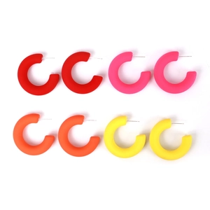 Matte candy-colored C-shaped resin hoop earrings in red, pink, orange, and yellow