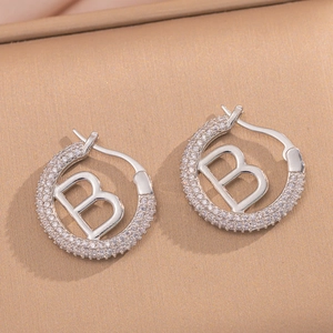 Silver micro-pave hoop earrings with letter B design and clear cubic zirconia stones