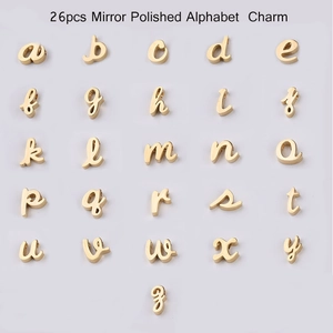 Set of 26 gold mirror polished alphabet charms with lowercase script font and holes