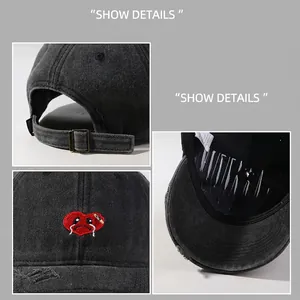 Distressed dark grey baseball cap with cartoon heart embroidery and washed cotton texture