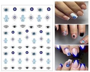 Detail view of blue evil eye and hamsa hand nail art stickers measuring 80mm by 103mm
