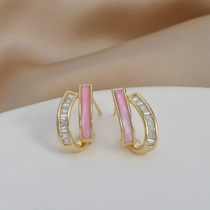 Macro shot of double-layered pink enamel earrings with rectangular cubic zirconia accents