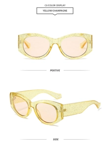 Detail view of yellow oval sunglasses with glitter finish and champagne resin frame