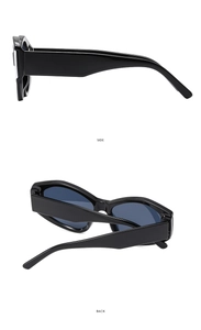 Detail view showing side and back angles of vintage black wide frame sunglasses