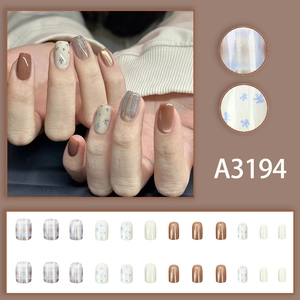 Short plaid floral cat eye press-on nail kit with 24 pieces in assorted colors