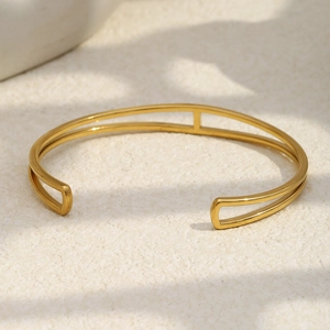 Minimalist double-layer 18K gold-plated stainless steel cuff bracelet with shadow aesthetic