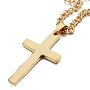Minimalist gold cross pendant necklace featuring a polished finish on a classic Cuban chain