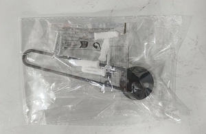 L-shaped metal hat rack installation kit with screws and expansion tubes in a sealed bag