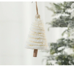 Detail view of a white plush Christmas tree ornament with a wooden base and hanging hemp rope