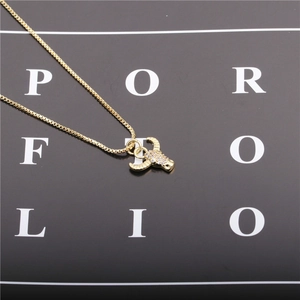 Golden necklace with cz micro-paved bull head pendant on professional black display card
