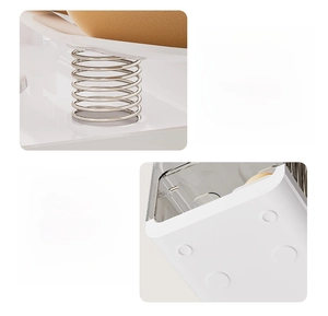 Detail of automatic rolling egg organizer with spring mechanism and non-slip bottom pads