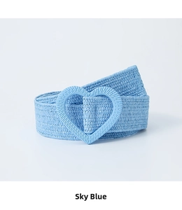 Close-up of sky blue woven elastic belt featuring a matching heart-shaped buckle detail