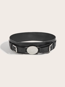 Detail of black wide leather waist belt featuring silver metal rings and double side buckles