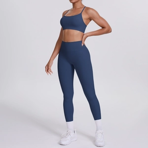 Dunkelblaues zweiteiliges Yoga-Set aus mattem Nylon mit überkreuztem Rückendesign