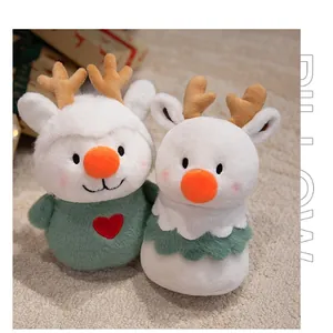 Detail of cute reindeer plush toys with holiday sweaters on a soft beige carpet