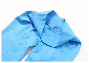 Macro detail of sky blue seamless yoga leggings showing ribbed high waist and elastic fabric