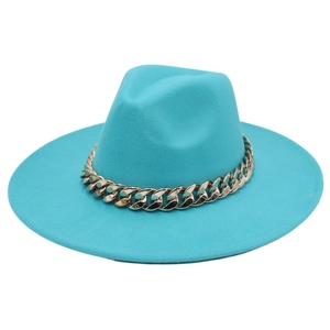 Detailed close-up of blue wool fedora hat with a bold chunky gold chain accessory