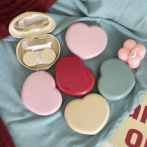 Cute heart-shaped contact lens case with mirror, tweezers, and solution bottle set