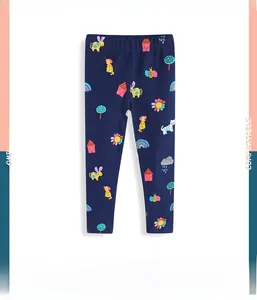 Vue détaillée du legging enfant bleu foncé avec motifs d'animaux colorés