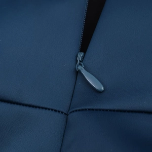 Close-up of the concealed invisible zipper on high-quality navy blue midi dress fabric