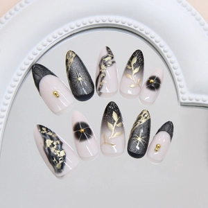 Cat-Eye-Muschel-Drucknägel mit goldenem Sternenregen und Marmormuster in Stiletto-Form
