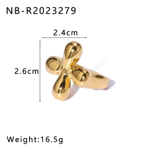 Detailed size view of a chunky gold teardrop ring showing 2.6cm by 2.4cm dimensions