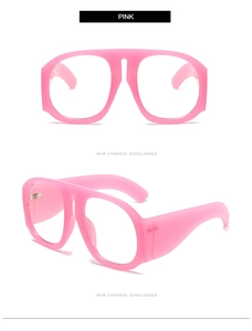 Close-up of pink oversized frames with matte finish and upgrade series text