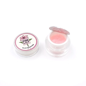 Detailed macro view of 5g pink eyelash glue remover gel in a clear jar and foil seal