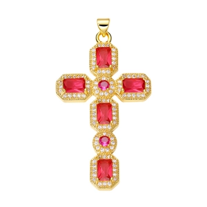 Detailed close-up of a gold cross pendant featuring a large red gem and tiny clear diamonds