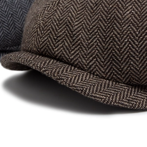 Classic coffee herringbone newsboy cap made of thick wool tweed fabric for men