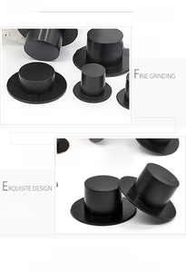 Miniature black plastic top hats for DIY snowman crafts and doll accessories detail view