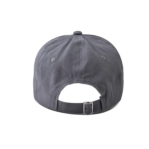 Detail of dark gray cotton baseball cap featuring a metal adjustable buckle and back strap