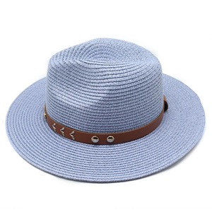 Top view of light blue woven cowboy hat featuring a leather band with silver metal rivets
