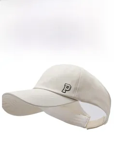 Detail of adjustable velcro strap and P letter embroidery on cream open top sun hat