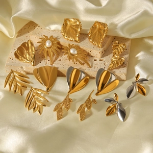 Luxurious 18k gold plated stainless steel leaf earrings with pearl accents on stone