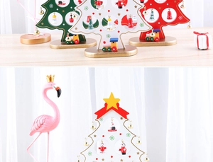 Close-up of wooden mini Christmas trees with colorful ornaments and small train base