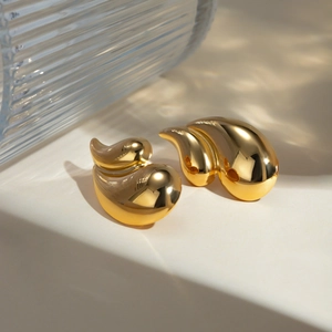 Modern 18K gold-plated titanium steel earrings with streamlined abstract drop design
