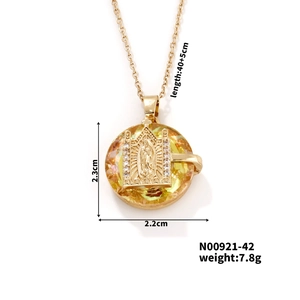 Detailed dimensions of gold saint mary pendant necklace with crystal and size markers