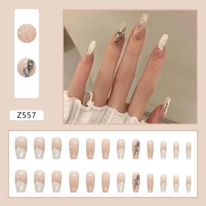 Long coffin press-on nails with creamy white marble finish and 3D silver rose accents