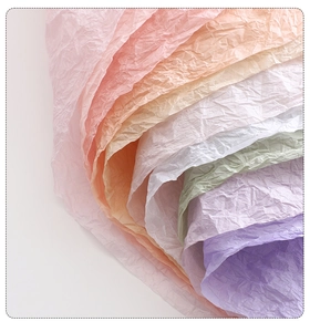 Close-up of colorful tissue paper with unique crinkle texture for gift wrapping