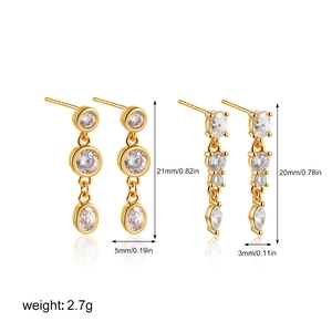 Detailed view of 18K gold plated earrings set with sizes 21mm and 20mm on white background