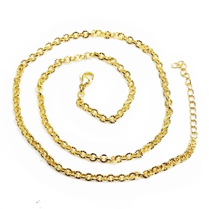 Close-up of golden ball chain necklace with lobster clasp and adjustable extension chain