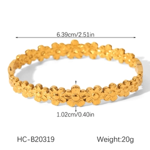 Detailed dimensions of gold stainless steel flower bangle with 6.39cm diameter and 20g weight